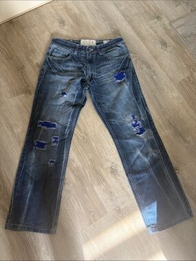 Relaxed Fit Distressed Blue Jeans
